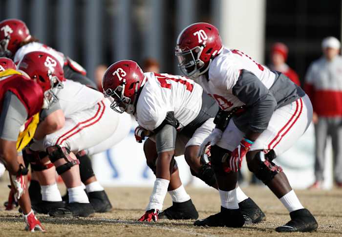 Alabama offensive linemen Evan Neal and Alex Leatherwood